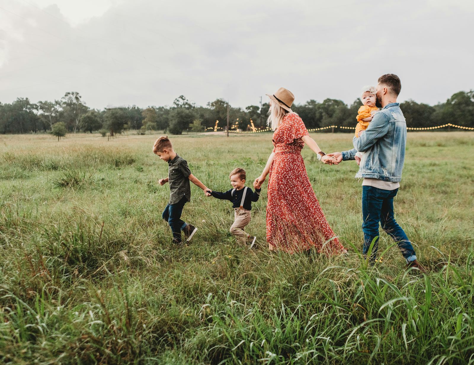 A family walking together through a field